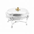 Silver jewelry box with a gold lid on a white background