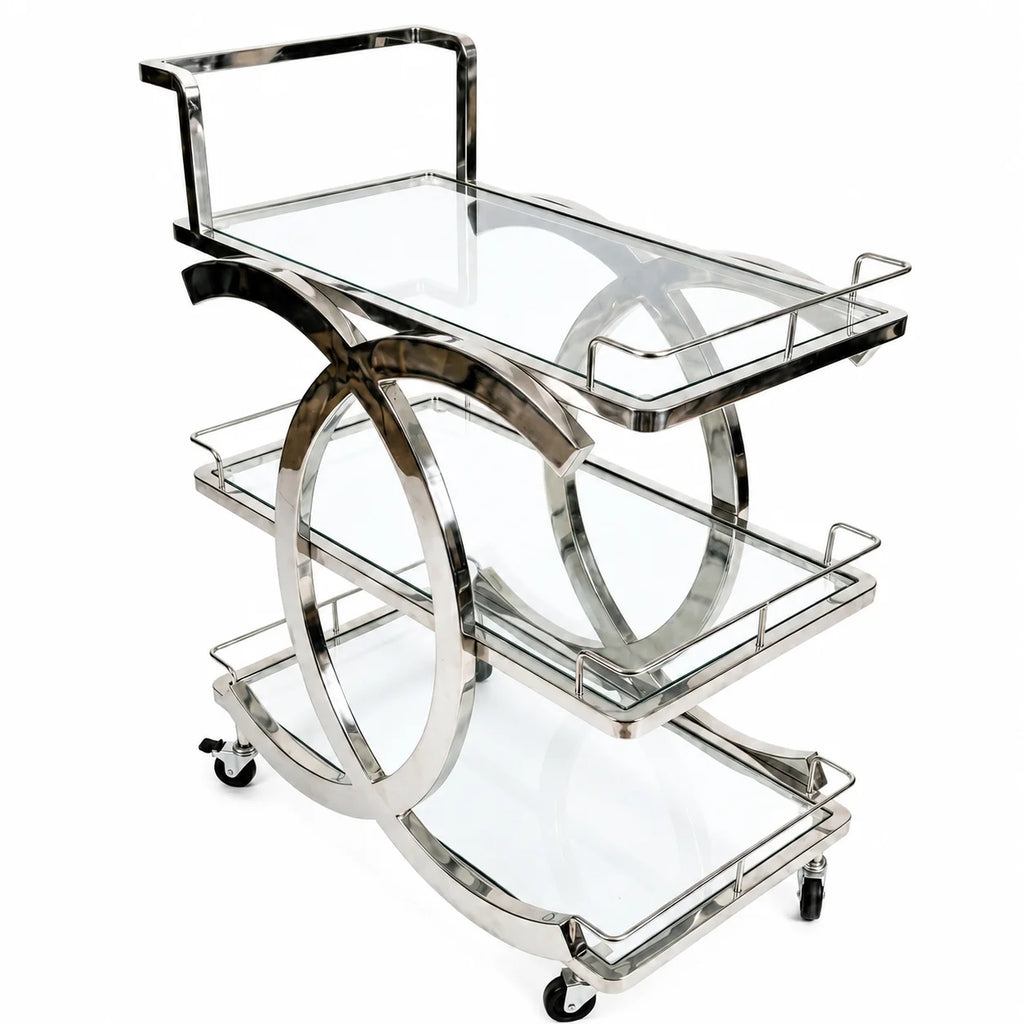 Decorative metal and glass serving cart on a white background