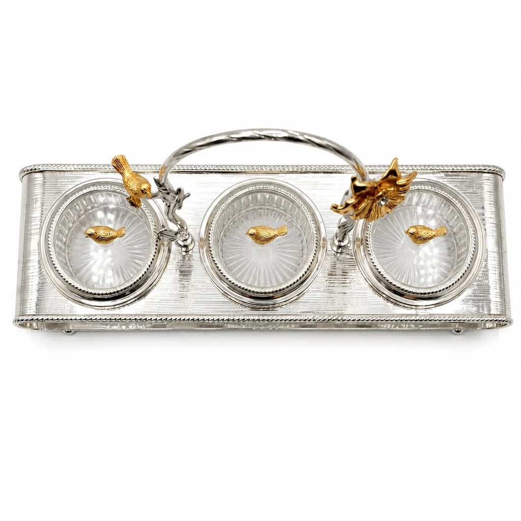 Silver clutch bag with gold accents on a white background