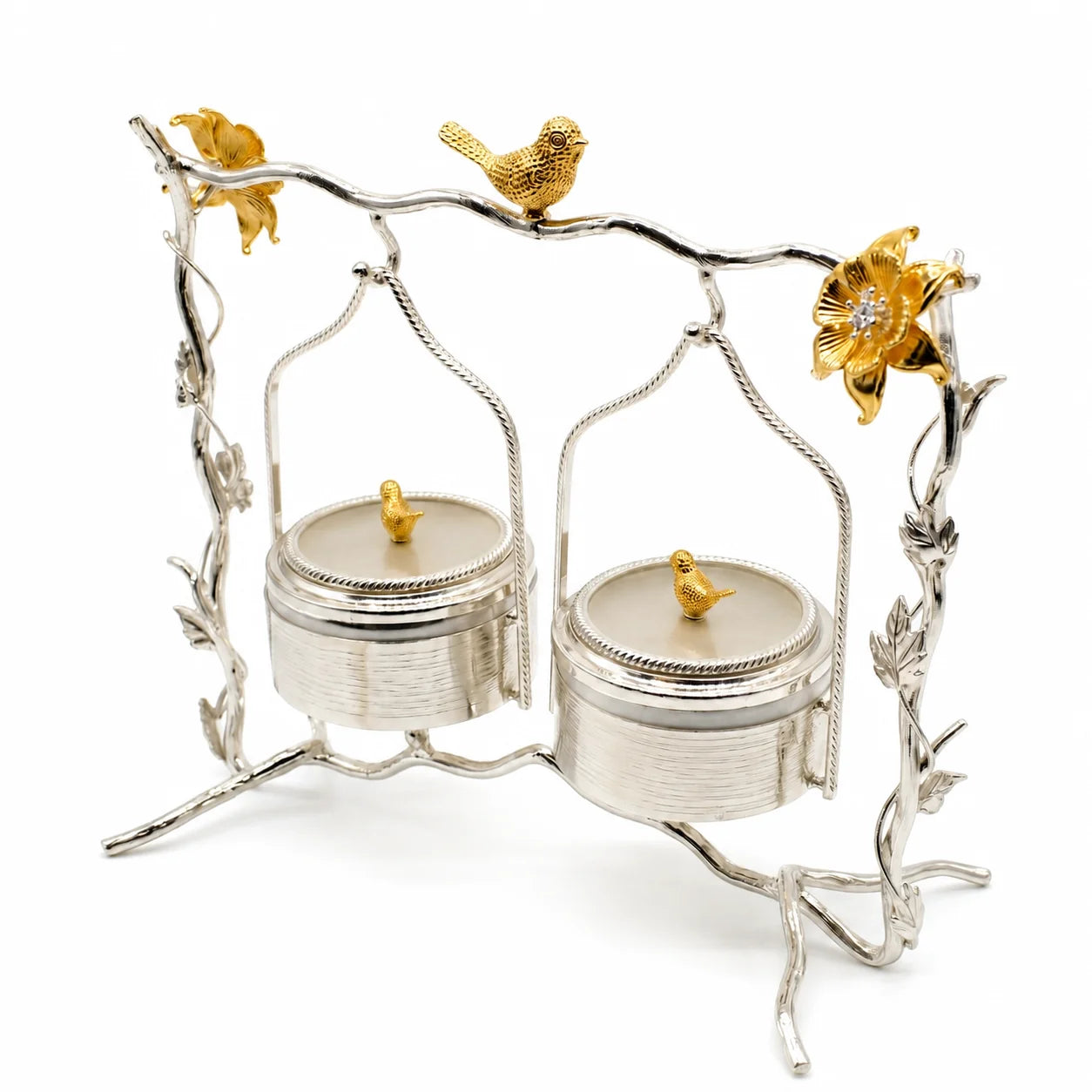 Decorative silver and gold jewelry stand with bird and flower details on a white background