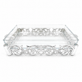 Decorative glass tray with intricate metalwork on a white background