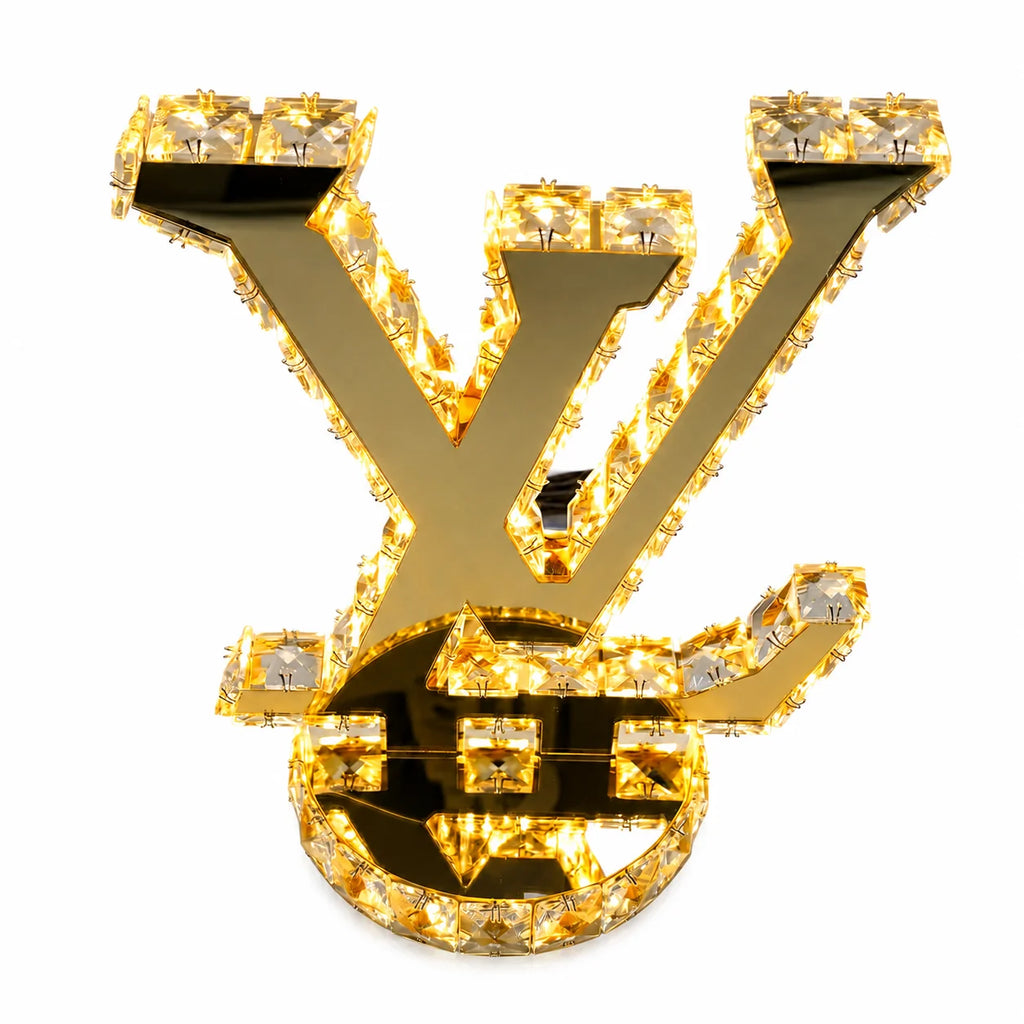 Gold letter 'Y' with crystals on a white background