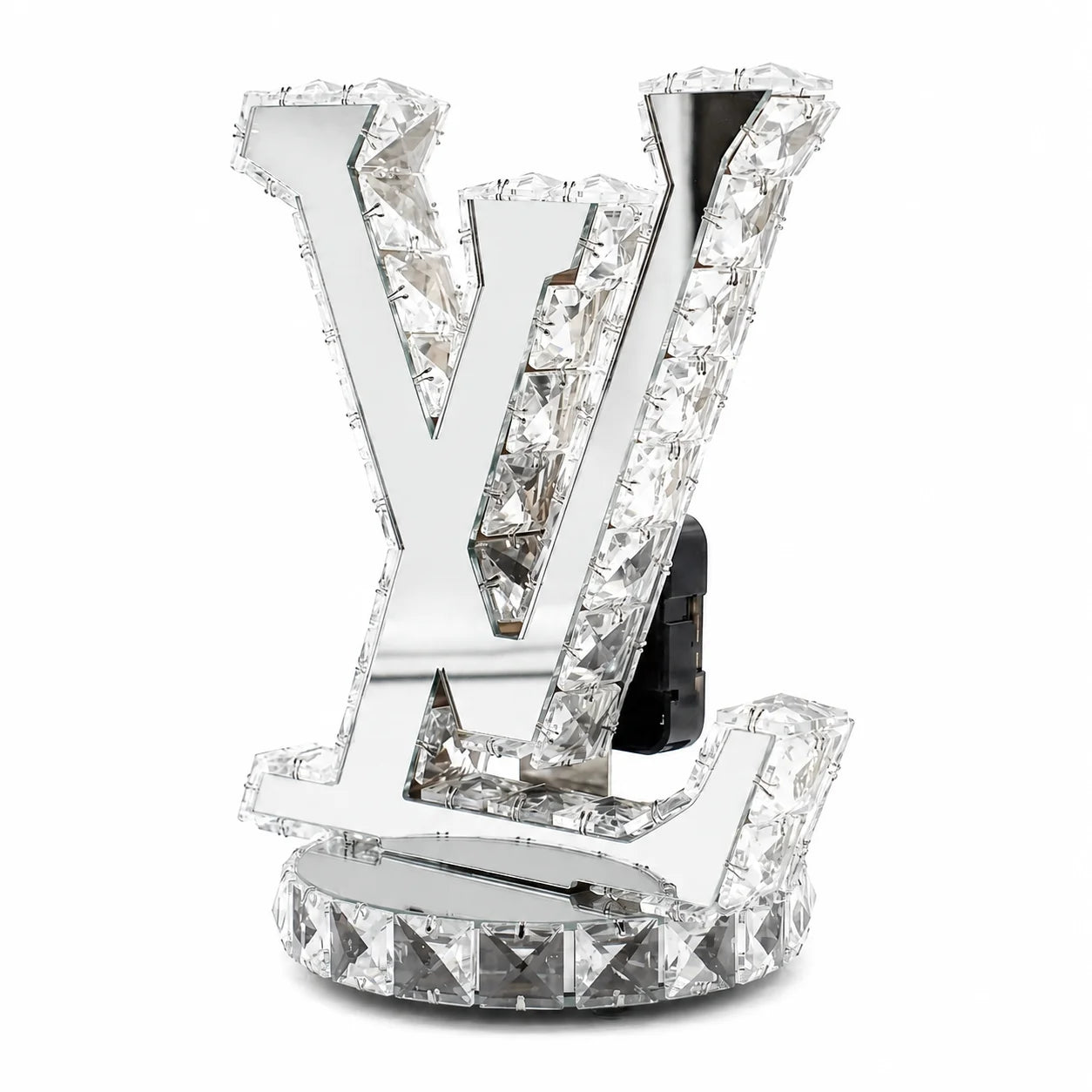Crystal decorative item with a prominent 'V' design on a white background