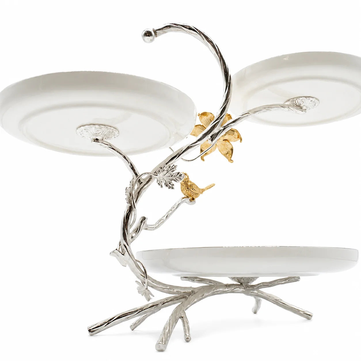 Decorative three-tiered serving tray with silver and gold accents on a white background